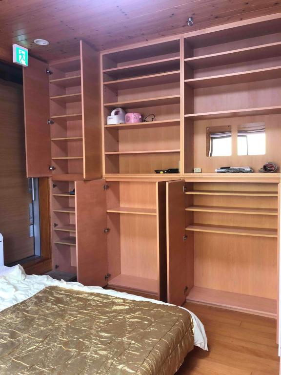 Postel nebo postele na pokoji v ubytování Guest House Wa N Wa 2