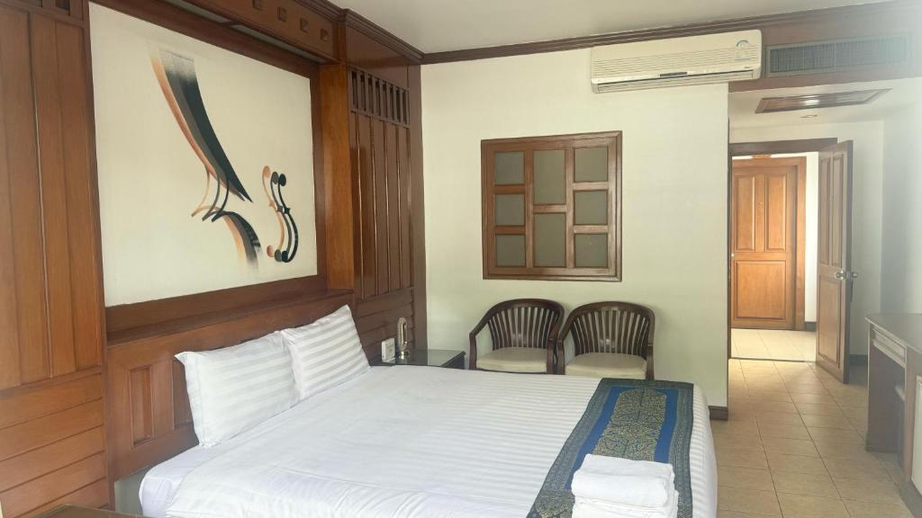Postel nebo postele na pokoji v ubytování Cocoon Talya Hotel