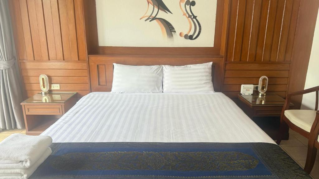 Postel nebo postele na pokoji v ubytování Cocoon Talya Hotel
