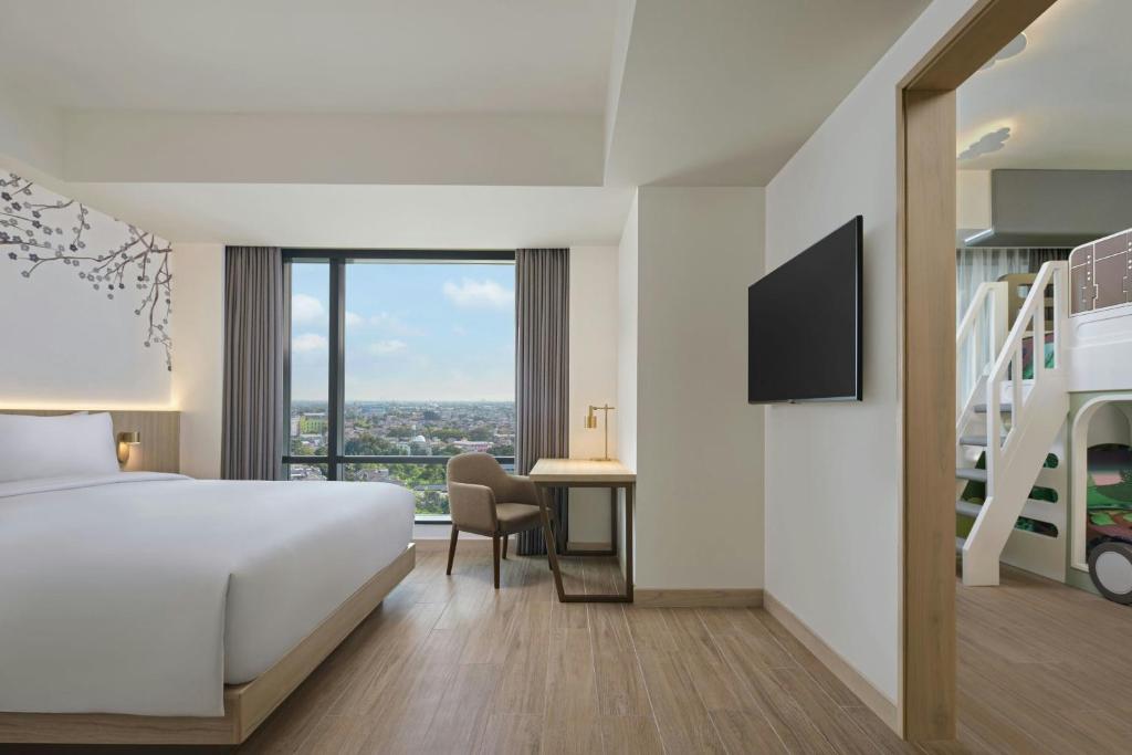 Postel nebo postele na pokoji v ubytování Fairfield by Marriott Bekasi