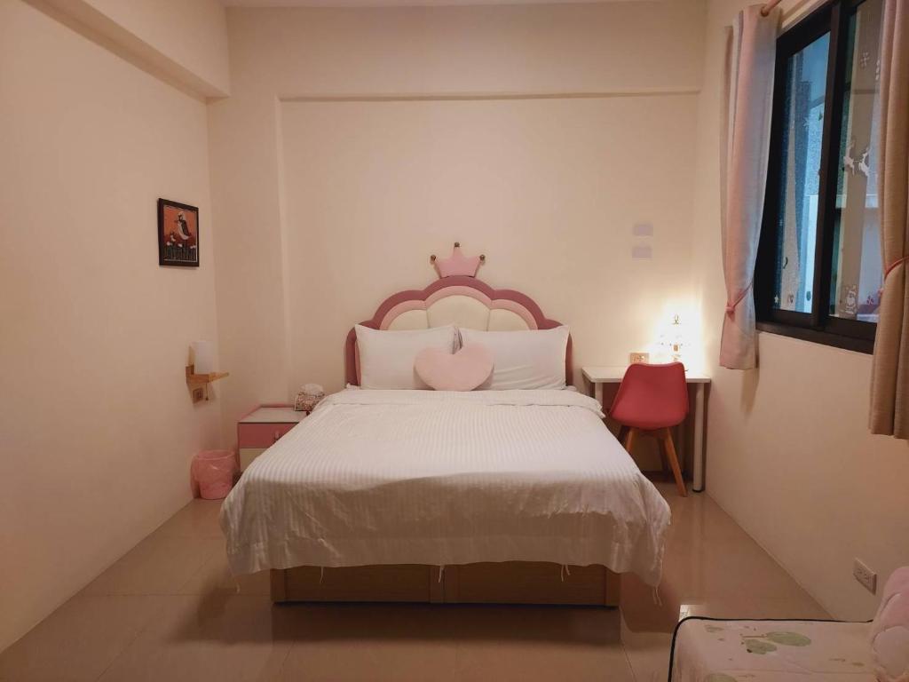 Postel nebo postele na pokoji v ubytování Bliss Inn