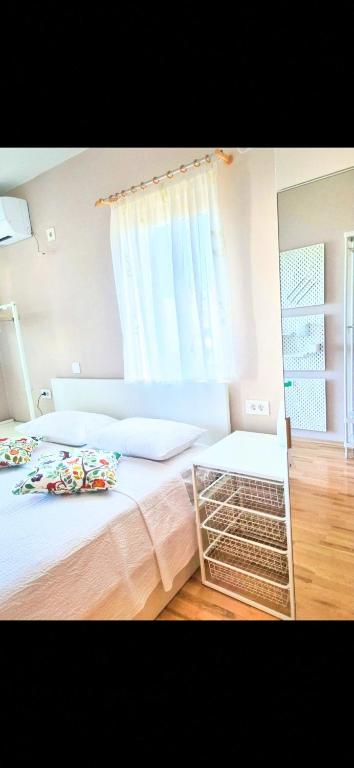 Postel nebo postele na pokoji v ubytování Apartmani Topolovec