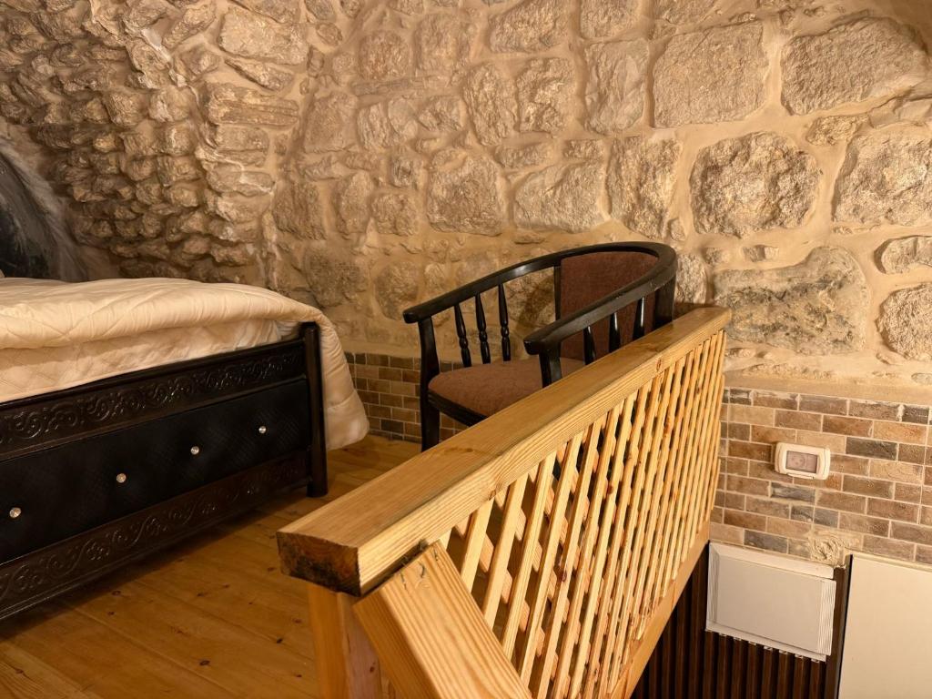 Voodi või voodid majutusasutuse ALKHAWAJAT Guest House toas