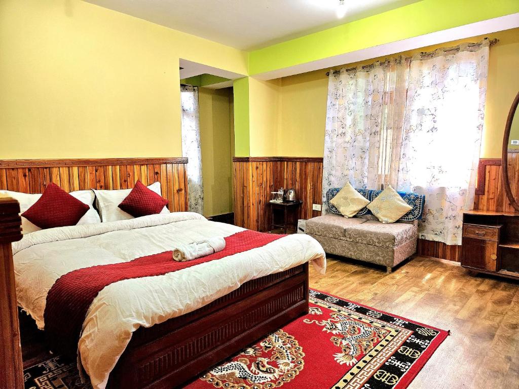 Postel nebo postele na pokoji v ubytování The Bliss Homestay