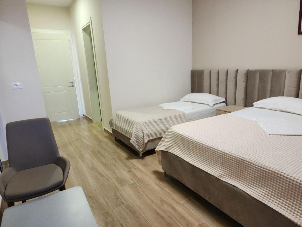 Postel nebo postele na pokoji v ubytování Hotel Maren Durres