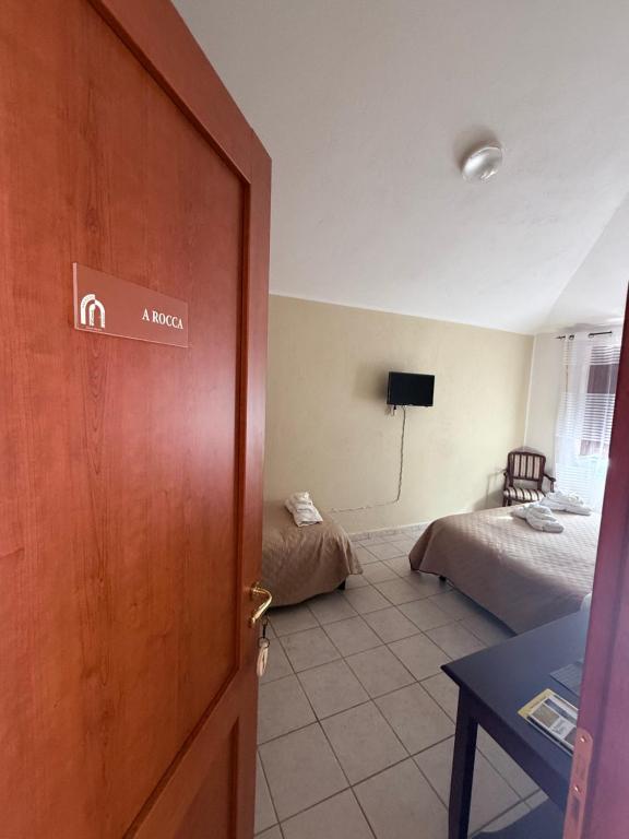 Postel nebo postele na pokoji v ubytování Palazzo 1815