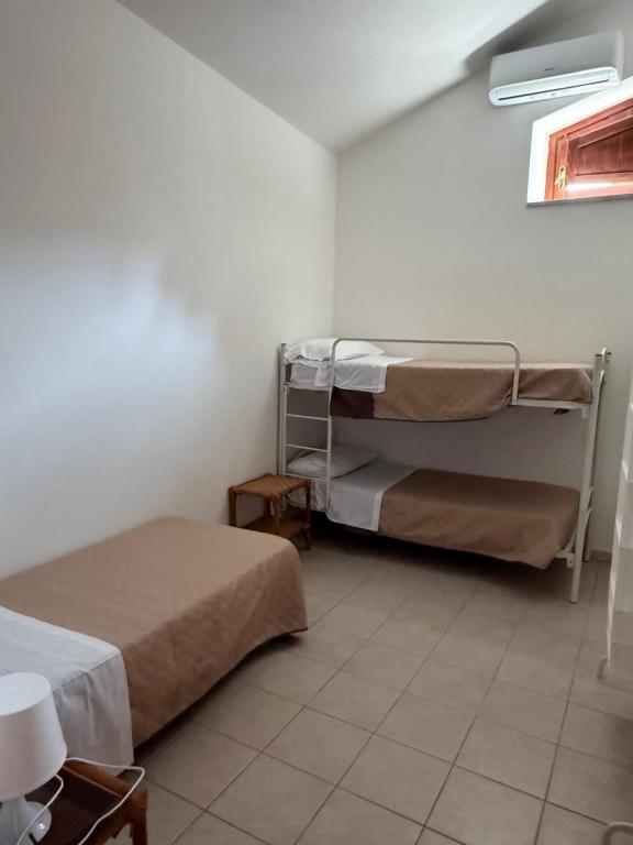 Postel nebo postele na pokoji v ubytování Palazzo 1815