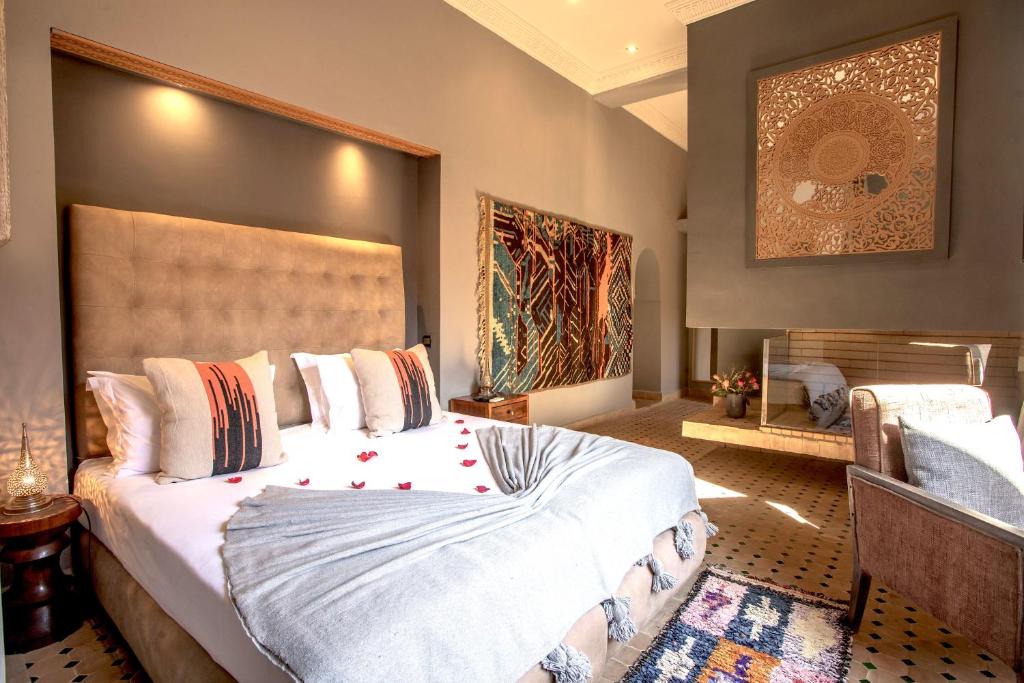 Postel nebo postele na pokoji v ubytování Le Riad Medina Privilège and Spa