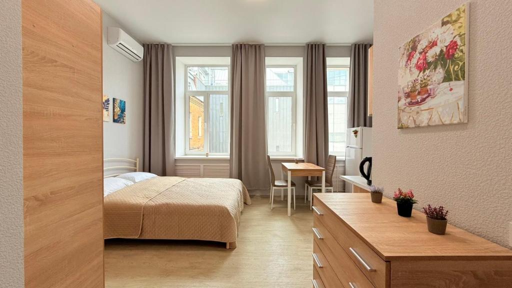 Postel nebo postele na pokoji v ubytování Centerline Apartments