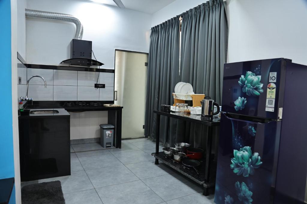 Majoituspaikan Fusion Home keittiö tai keittotila