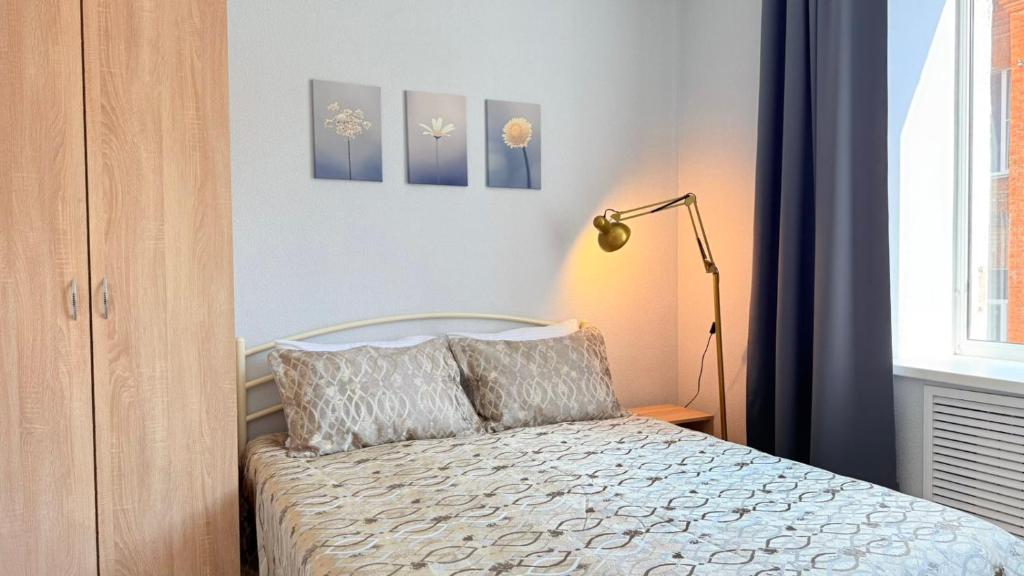 Postel nebo postele na pokoji v ubytování Centerline Apartments