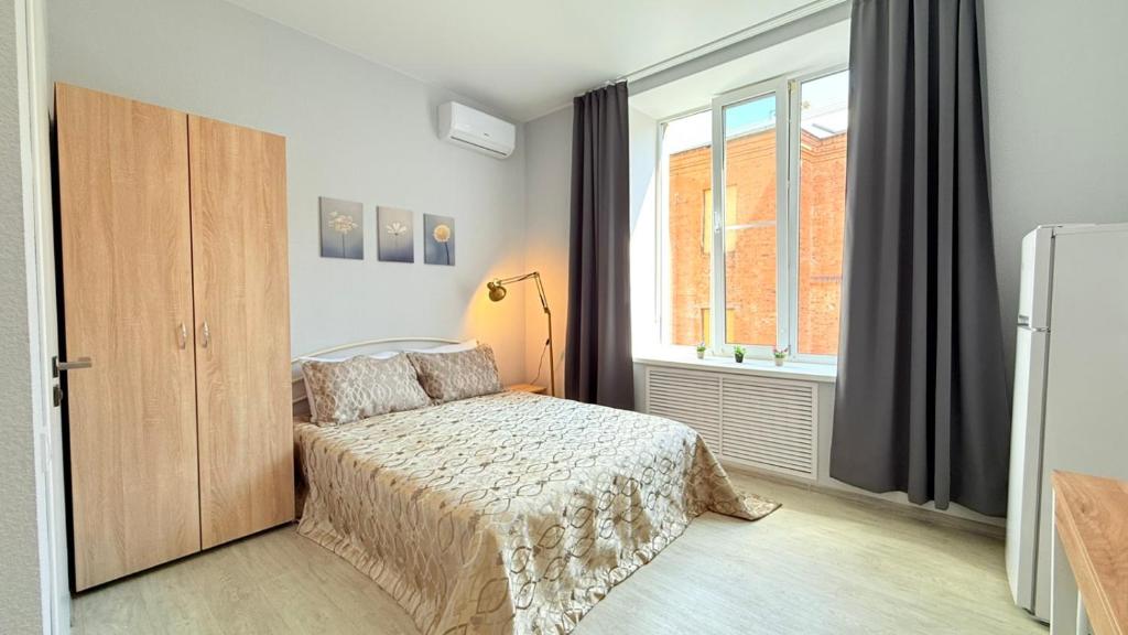Postel nebo postele na pokoji v ubytování Centerline Apartments