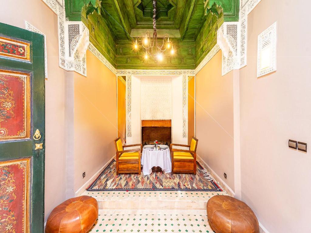 Postel nebo postele na pokoji v ubytování Le Riad Medina Privilège and Spa