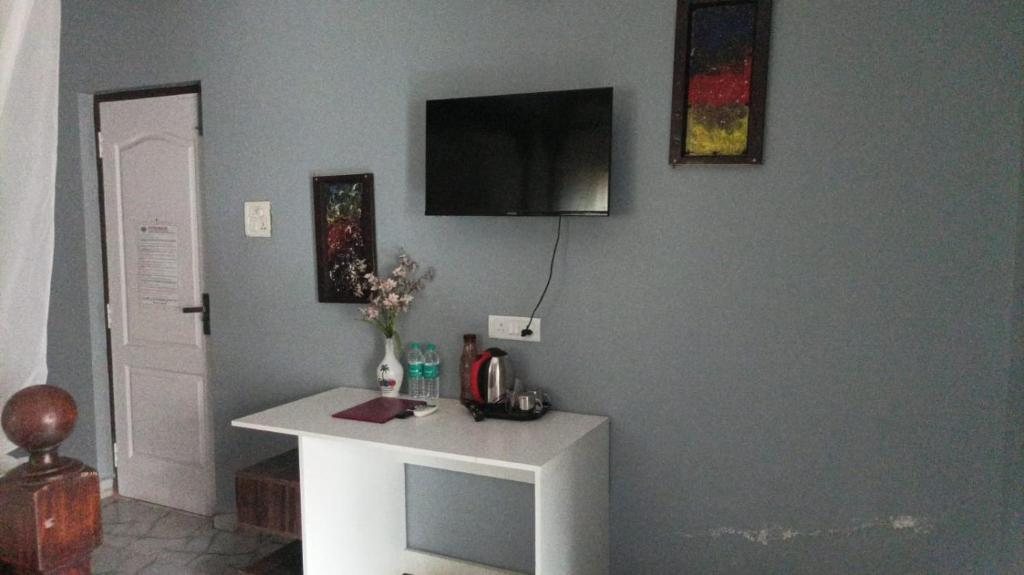 TV a/nebo společenská místnost v ubytování Casa Almeida Hotel