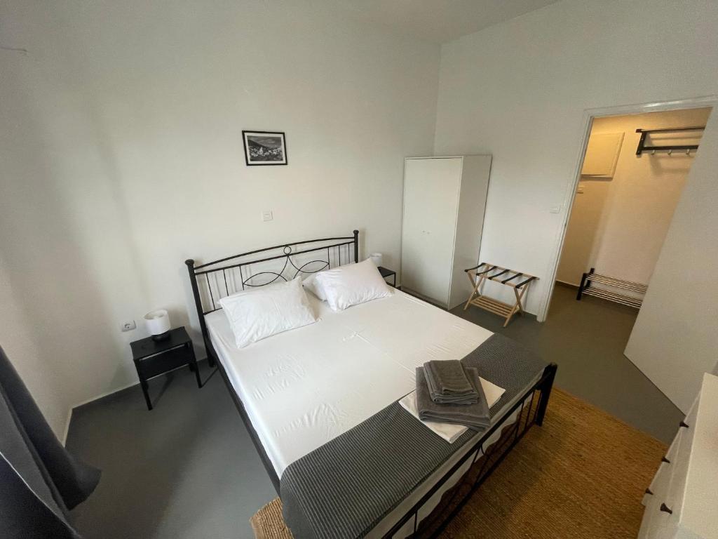 Postel nebo postele na pokoji v ubytování Spanos Apartments - Panteli