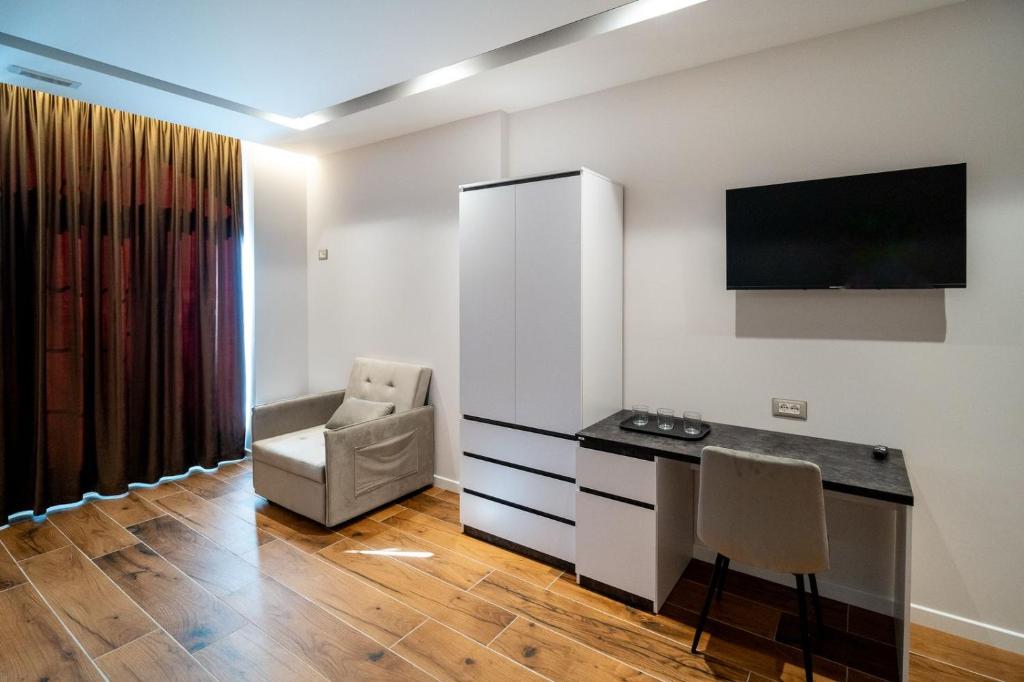 Kuchyň nebo kuchyňský kout v ubytování Hotel LUMINOSA