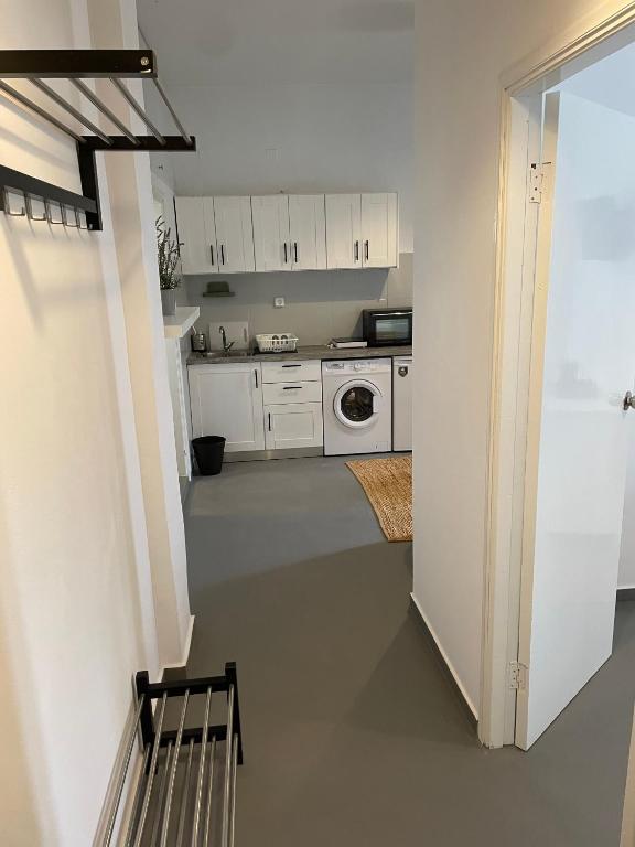 Kuchyň nebo kuchyňský kout v ubytování Spanos Apartments - Panteli