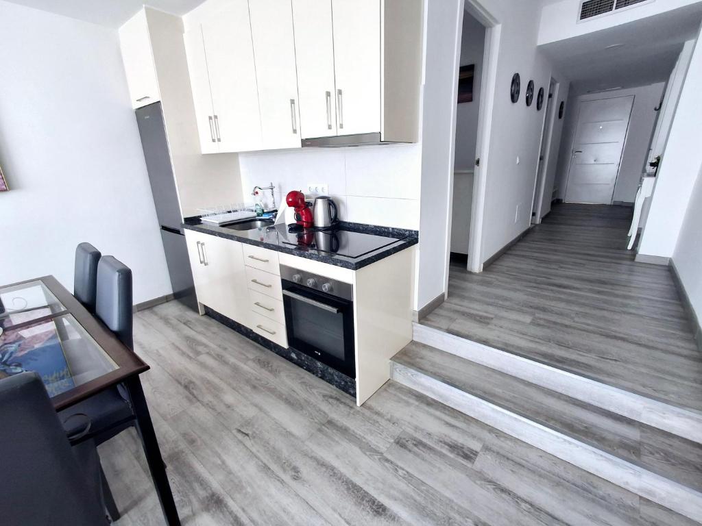 A kitchen or kitchenette at Rancho A 112