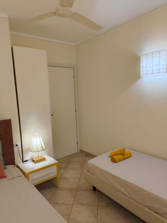 Postel nebo postele na pokoji v ubytování Marialva Tropical T2