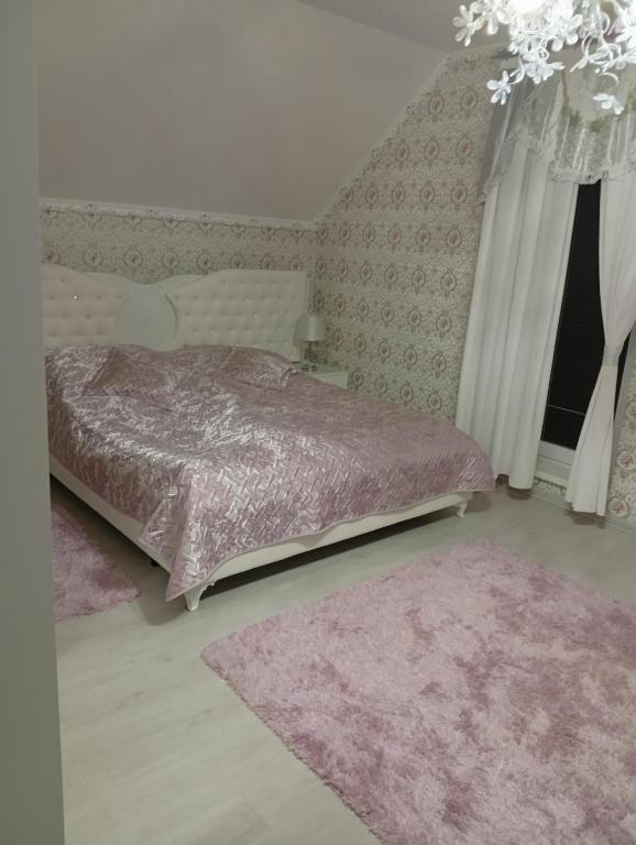 Postel nebo postele na pokoji v ubytování U katky