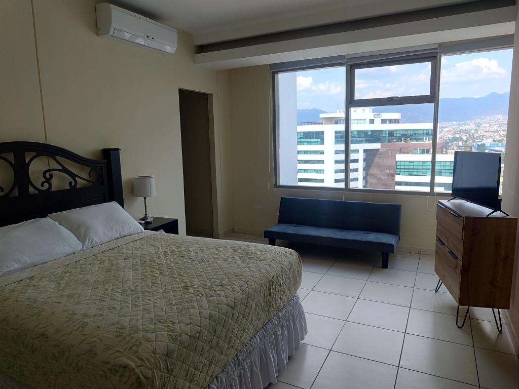 Postel nebo postele na pokoji v ubytování Moderno y cómodo apartamento