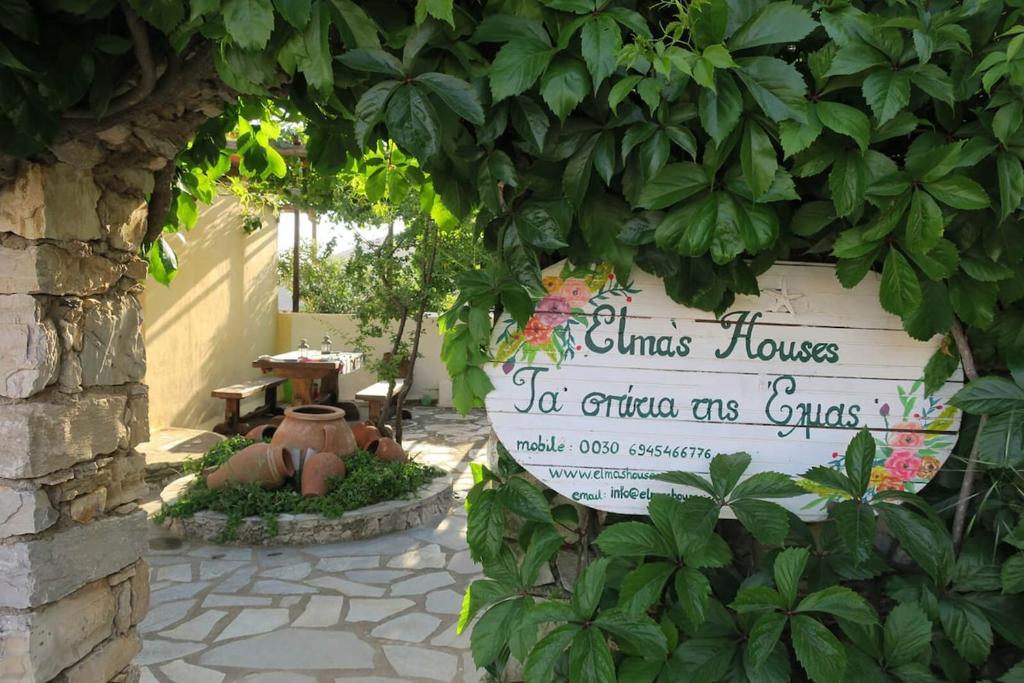 a sign that says christ house to children as guests at Avra traditional Blue house, Elma's Houses in Alonnisos Old Town