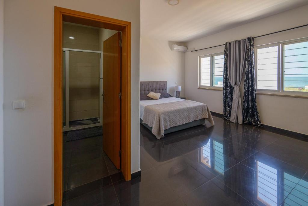 Postel nebo postele na pokoji v ubytování Villa RESIDENCIAL EUNICE