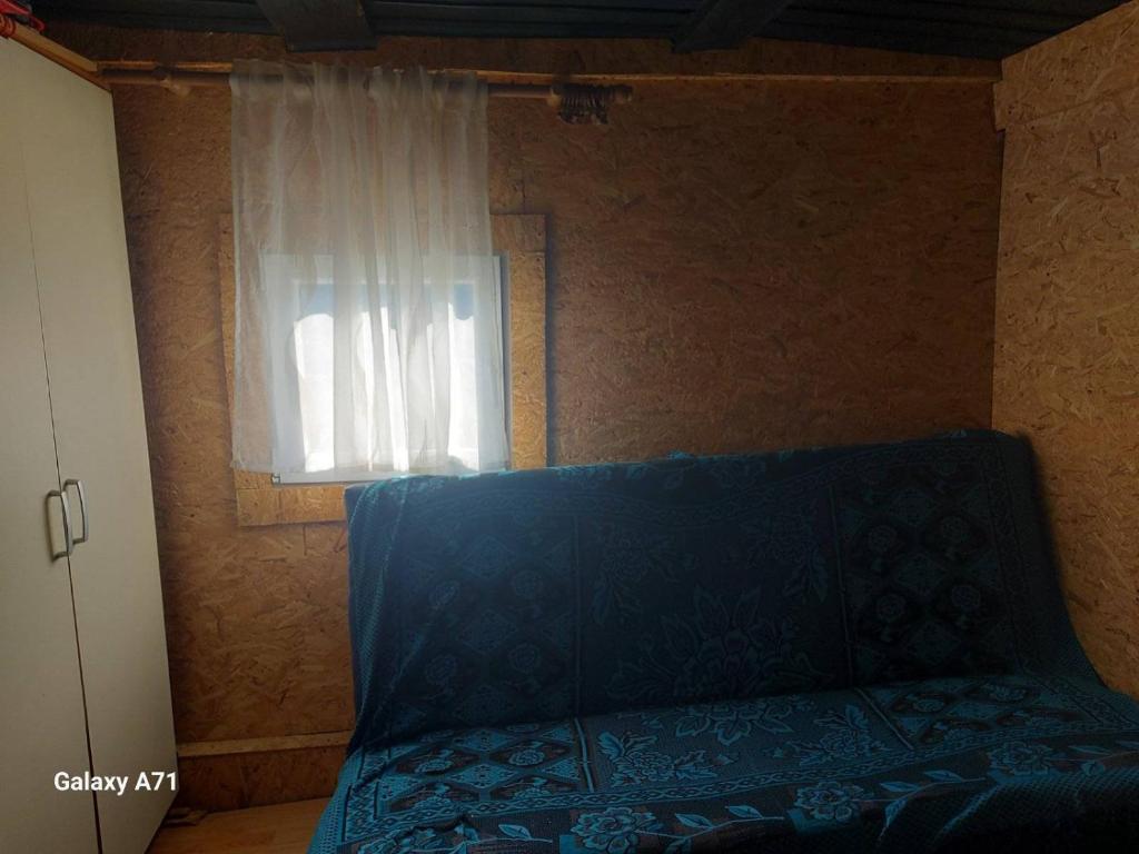 Postel nebo postele na pokoji v ubytování Legat tri brata