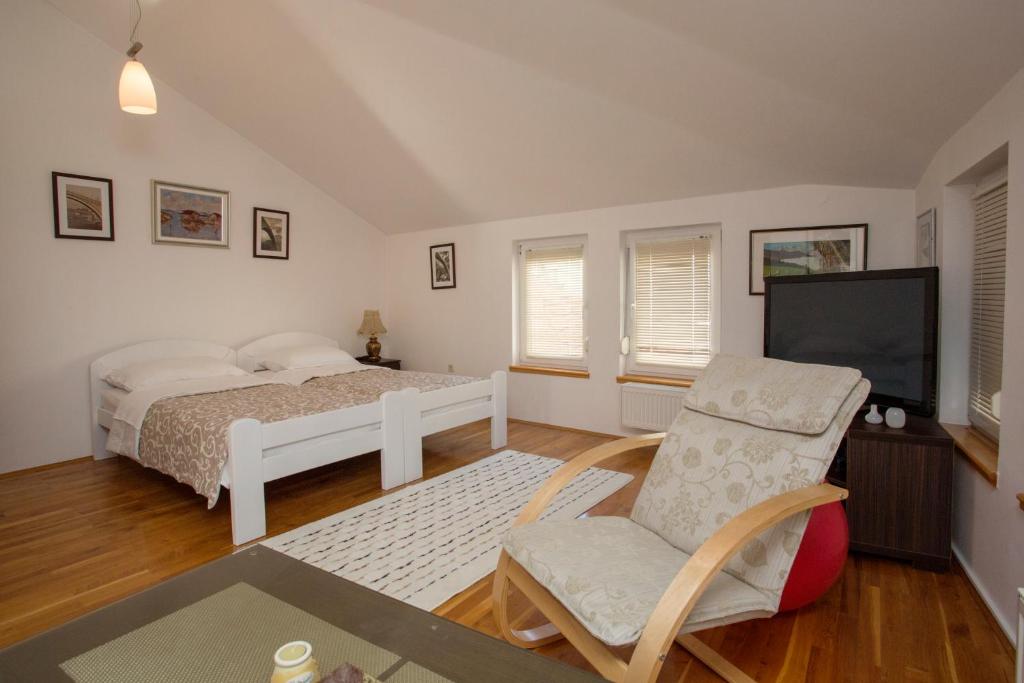 Postel nebo postele na pokoji v ubytování Guesthouse Rota