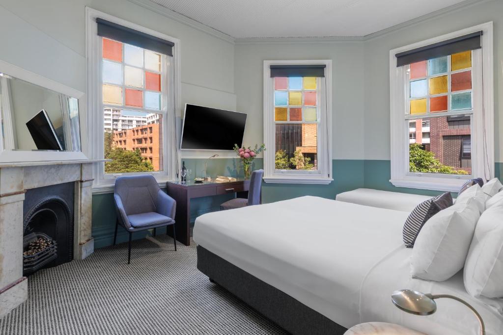 TV a/nebo společenská místnost v ubytování Vulcan Hotel Sydney