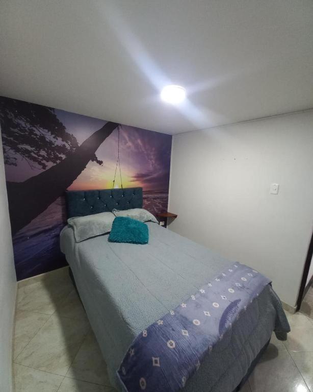 Postel nebo postele na pokoji v ubytování Hospedaje la Magia de Zipaquirá