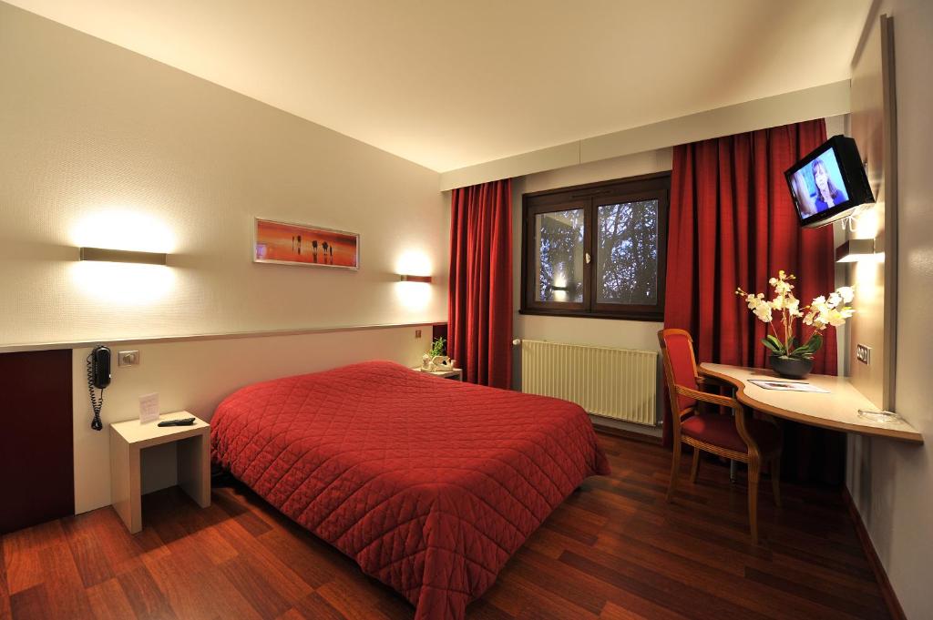Postel nebo postele na pokoji v ubytování Sud Hotel