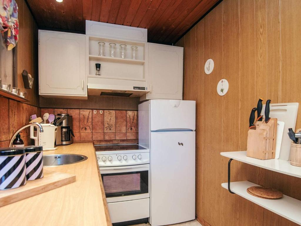Kuchyň nebo kuchyňský kout v ubytování Holiday home Toftlund XV