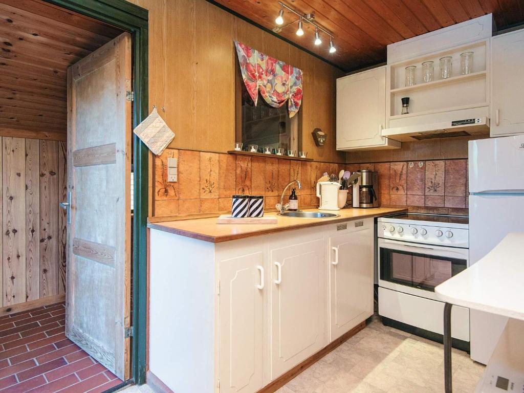 Kuchyň nebo kuchyňský kout v ubytování Holiday home Toftlund XV