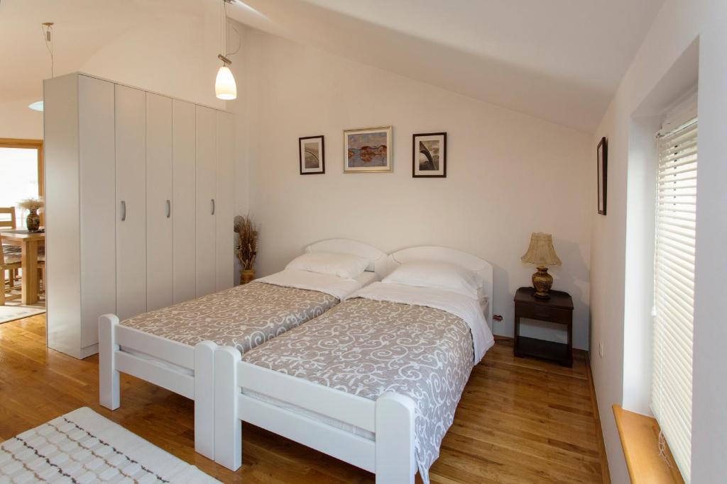 Postel nebo postele na pokoji v ubytování Guesthouse Rota