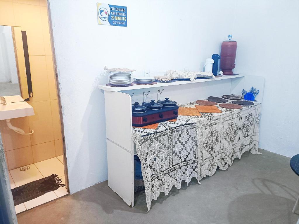 Kuchyň nebo kuchyňský kout v ubytování Pousada Sol e Mar de Pajuçara