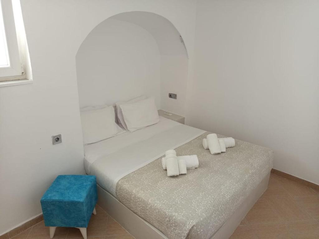 Postel nebo postele na pokoji v ubytování Golden View Villas