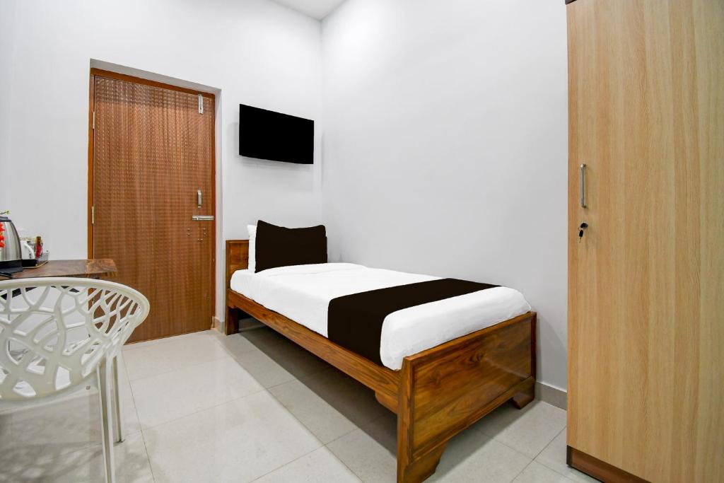 Postel nebo postele na pokoji v ubytování Hotel O Moon Guest House