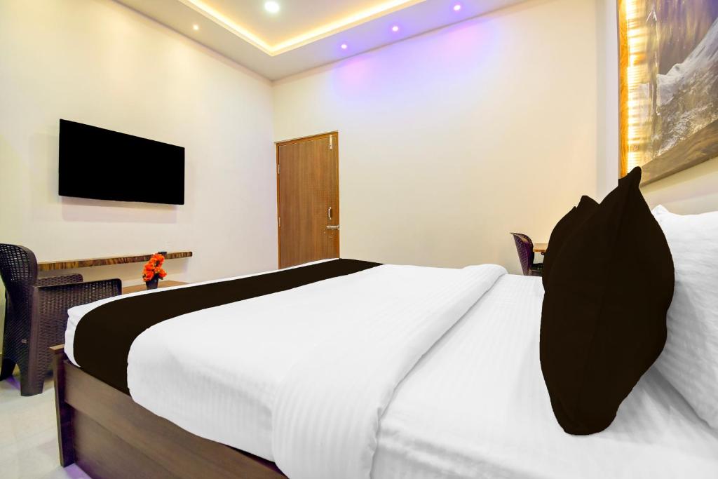 TV a/nebo společenská místnost v ubytování Hotel O Moon Guest House