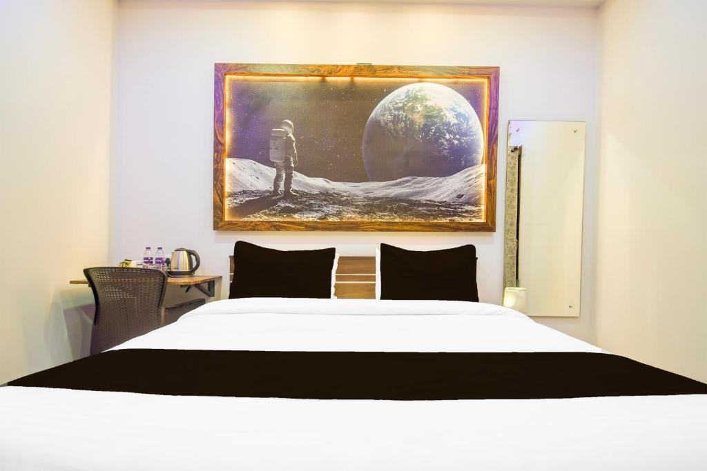 Postel nebo postele na pokoji v ubytování Hotel O Moon Guest House