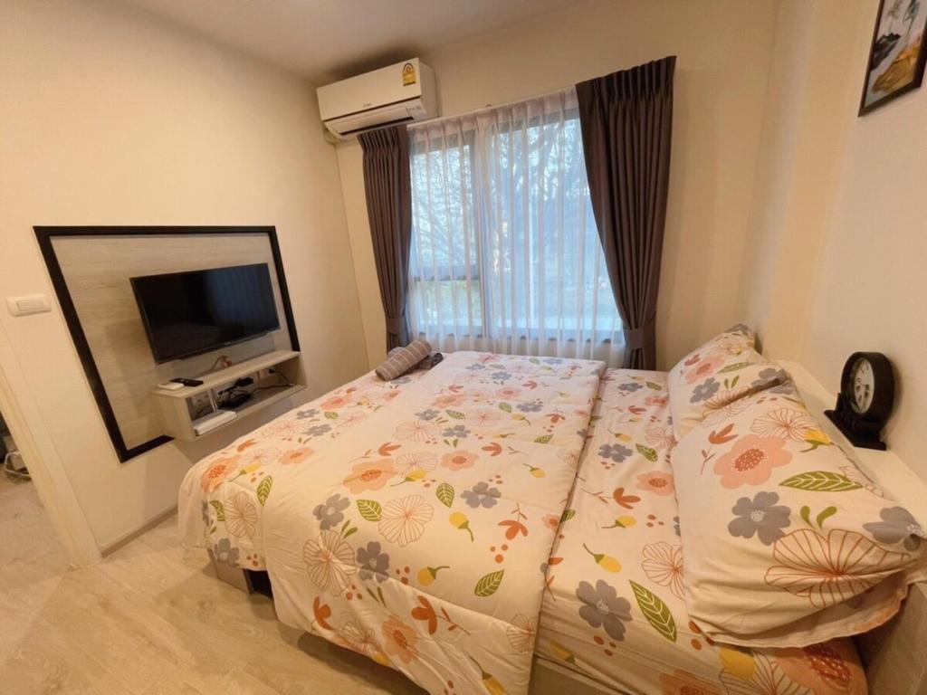 Postel nebo postele na pokoji v ubytování Escent ville Chiang Mai F3B2