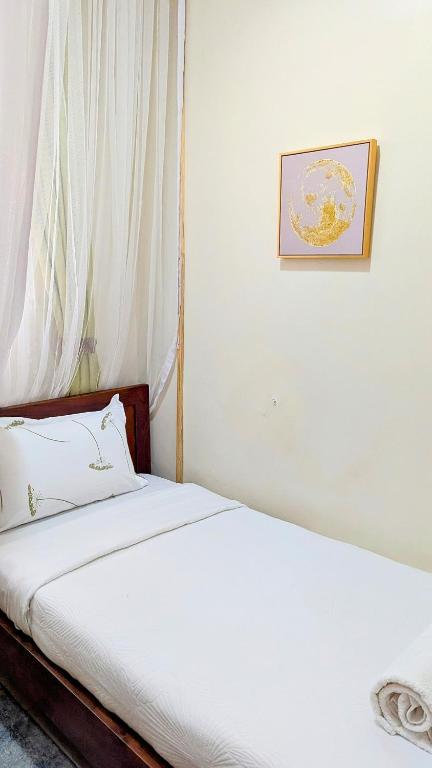 Postel nebo postele na pokoji v ubytování Ahva III Residence