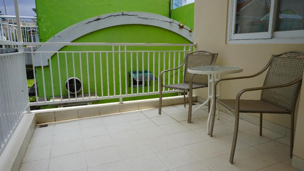 Balkón nebo terasa v ubytování Diyar Villas Puncak K3/2A