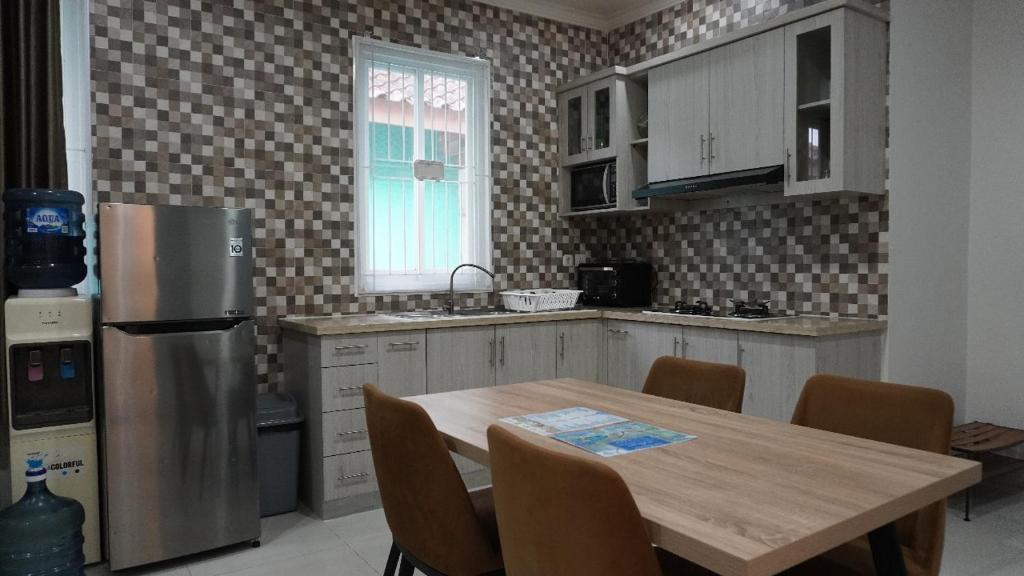 Kuchyň nebo kuchyňský kout v ubytování Diyar Villas Puncak F4/8