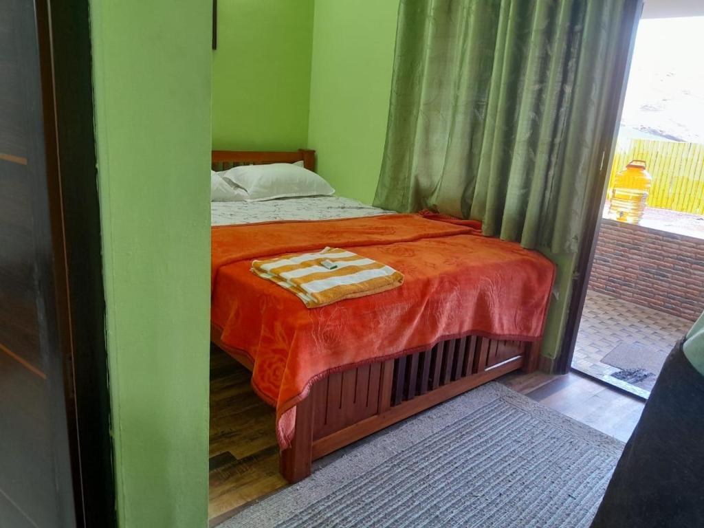 Postel nebo postele na pokoji v ubytování SPATHODEA
