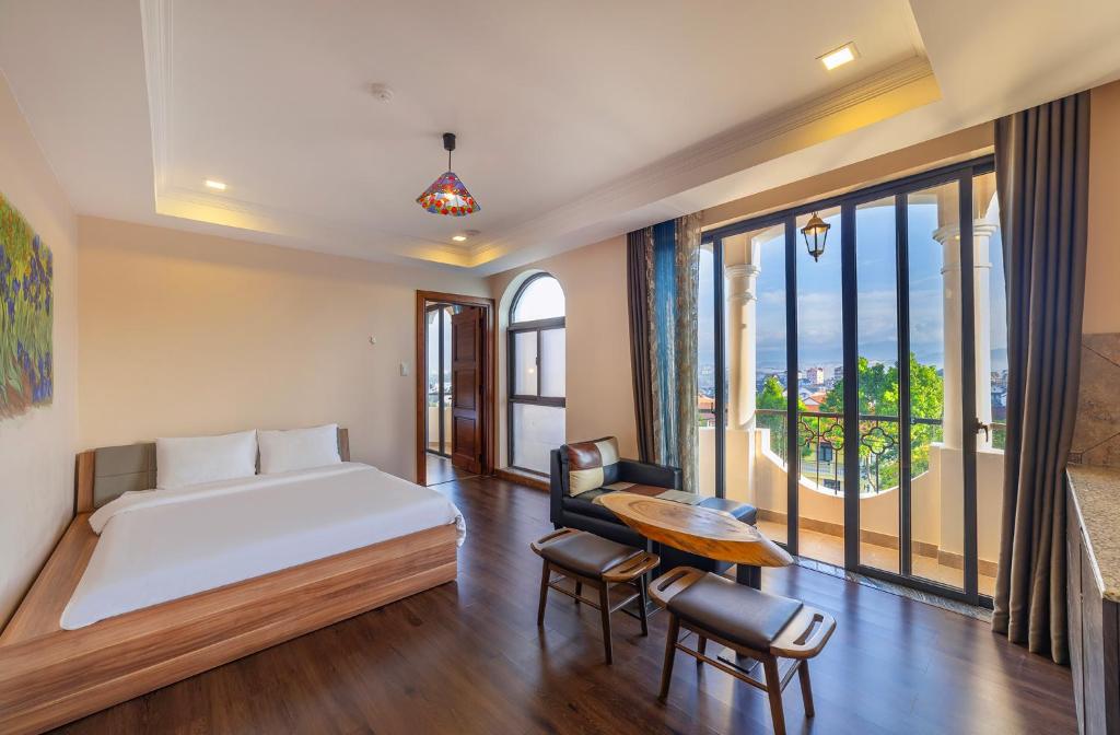 Postel nebo postele na pokoji v ubytování Guava Hill Boutique Hotel