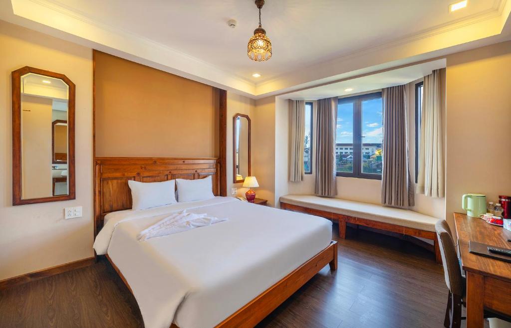 Postel nebo postele na pokoji v ubytování Guava Hill Boutique Hotel