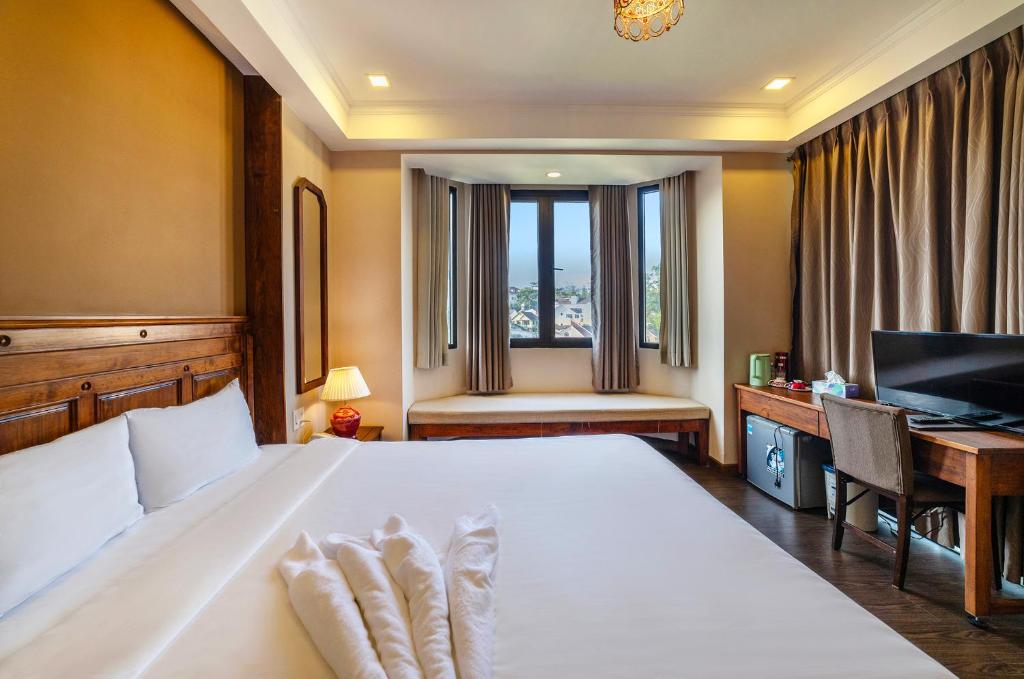 Postel nebo postele na pokoji v ubytování Guava Hill Boutique Hotel