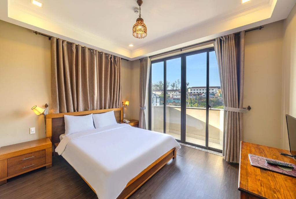 Postel nebo postele na pokoji v ubytování Guava Hill Boutique Hotel