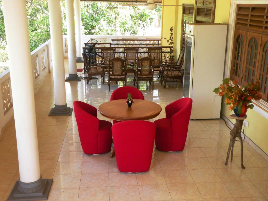 Posezení v ubytování Henderson Airport Residence